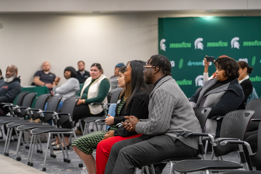 Audience members support the newest cohort of graduates from The Culture of Finances program.