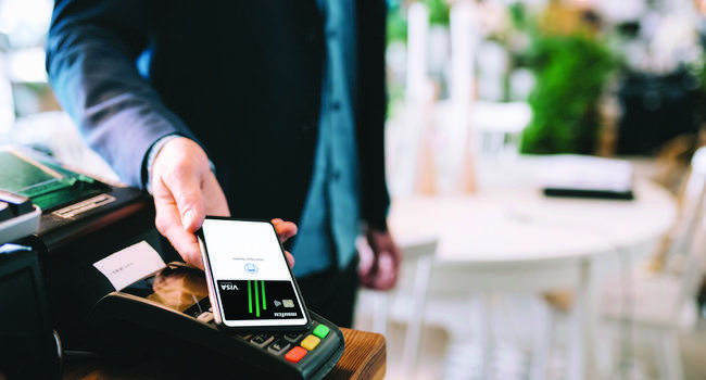 Person using smartphone to make a purchase
