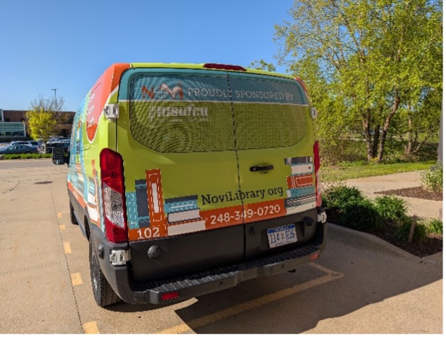 Photo shows the back end of the Novi Public Library mobile library van.